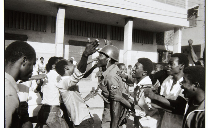 Danny Lyons, The soldier is greeted as hero. February 7, Port-au-Prince, 1983-86, Silver gelatin print, 8 1/2 x 13 in.