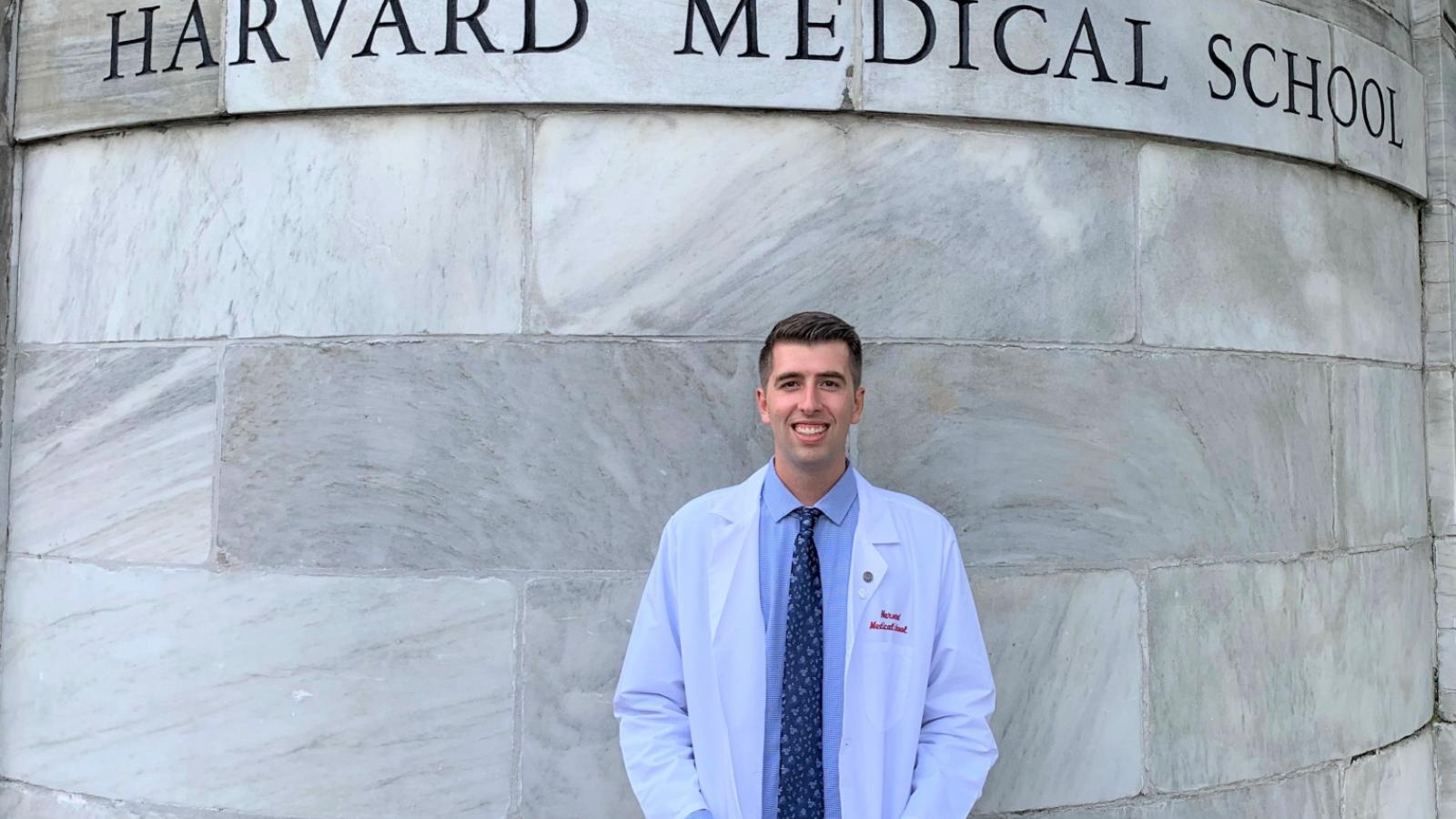 Grant Steele in front of Harvard Medical School