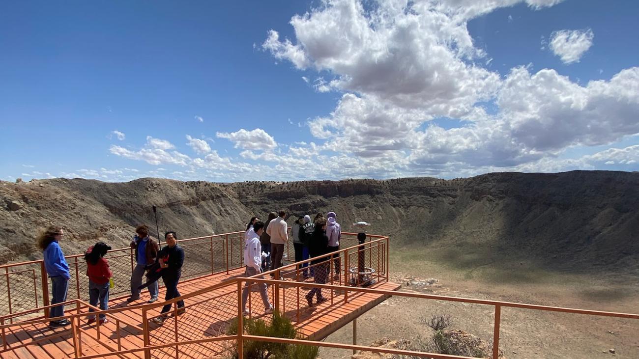 group viewing meteor crater
