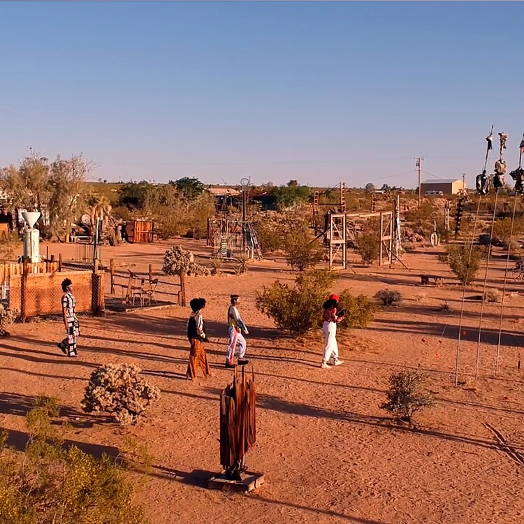 desert landscape with people