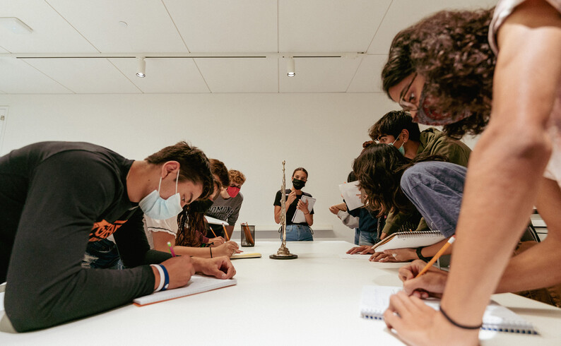 Students observing a work of art 