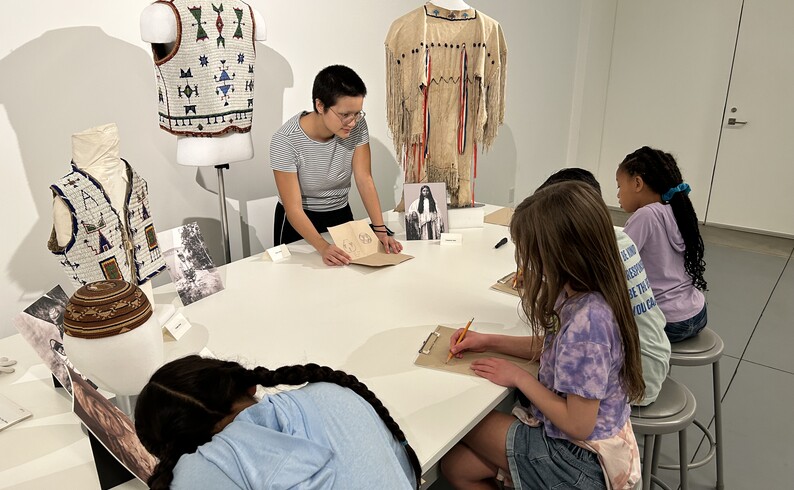 group of children draw objects