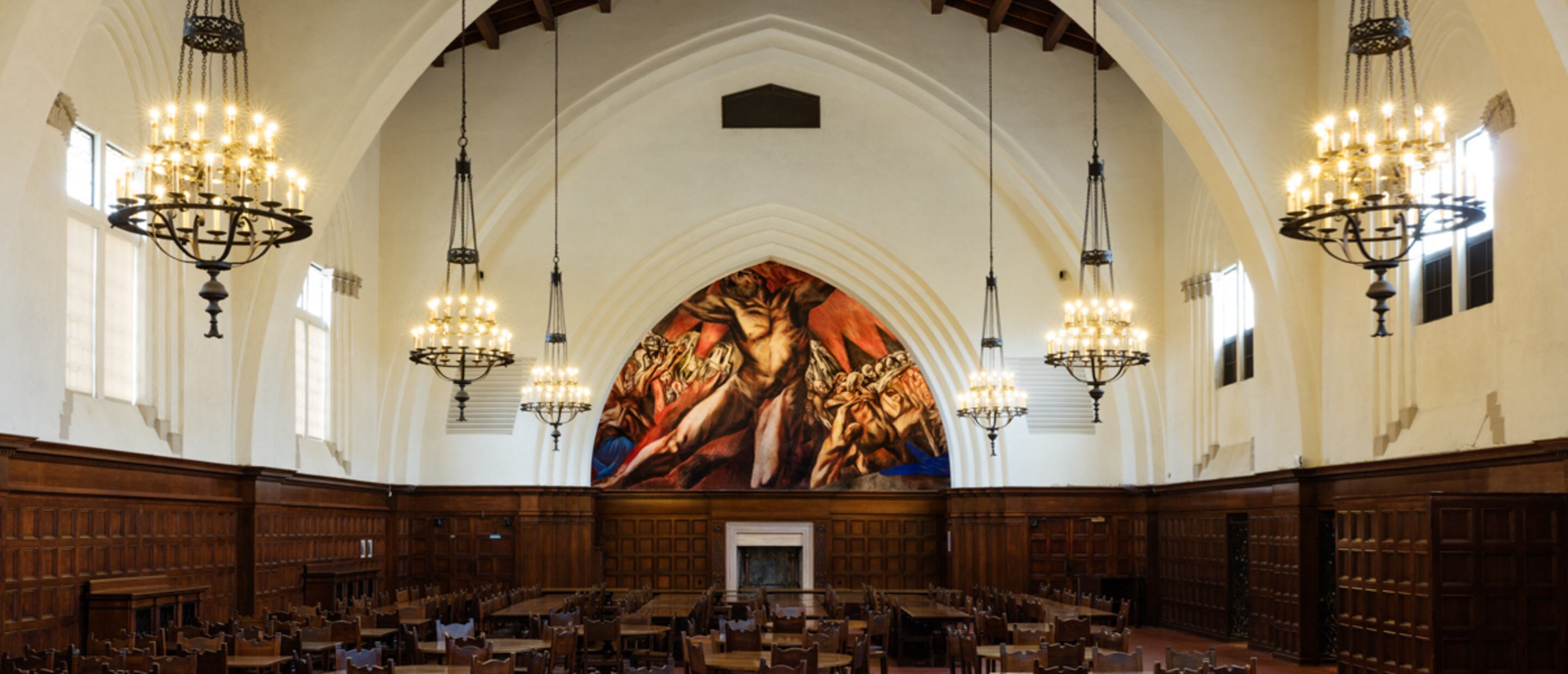 Mural in a dining hall illustrating figure of Prometheus framed within an arch