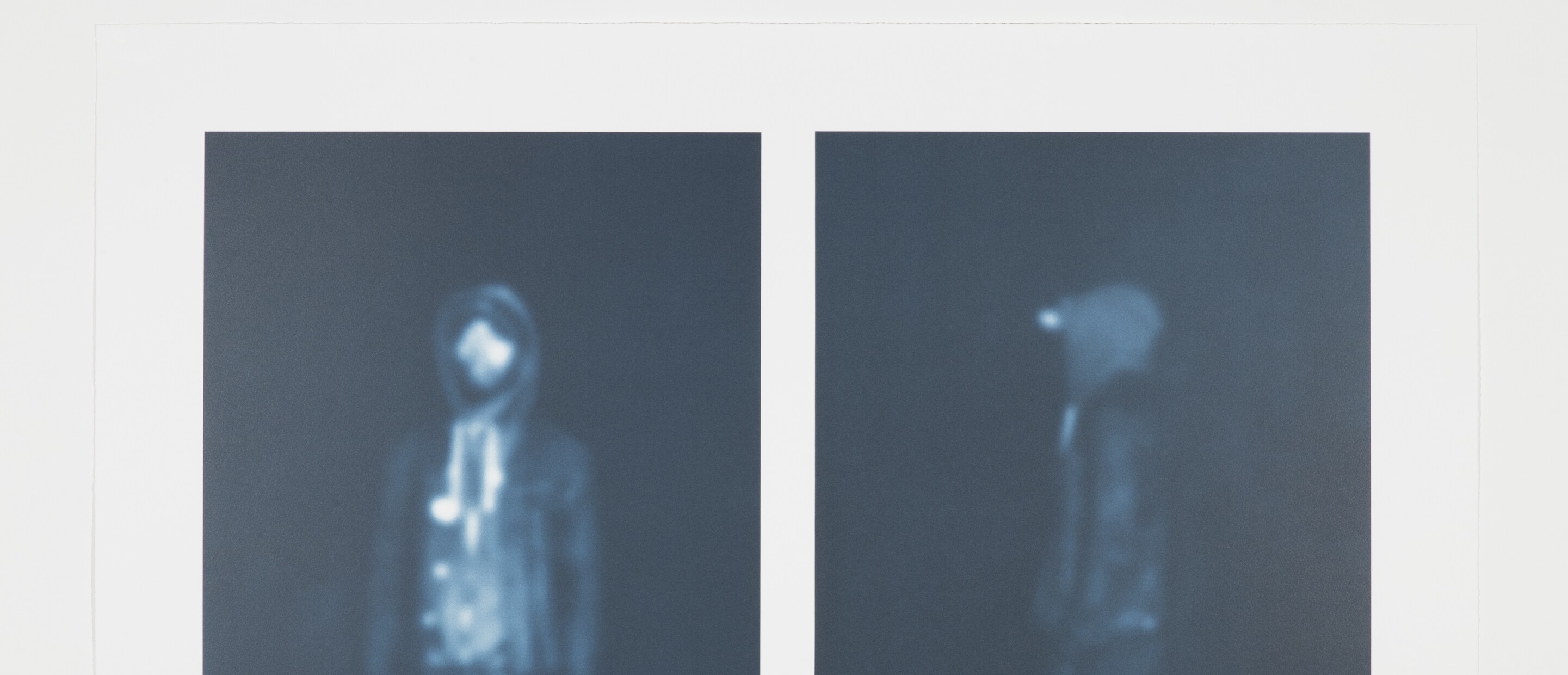 Diptych monochromatic image of fuzzy figure in hoodie