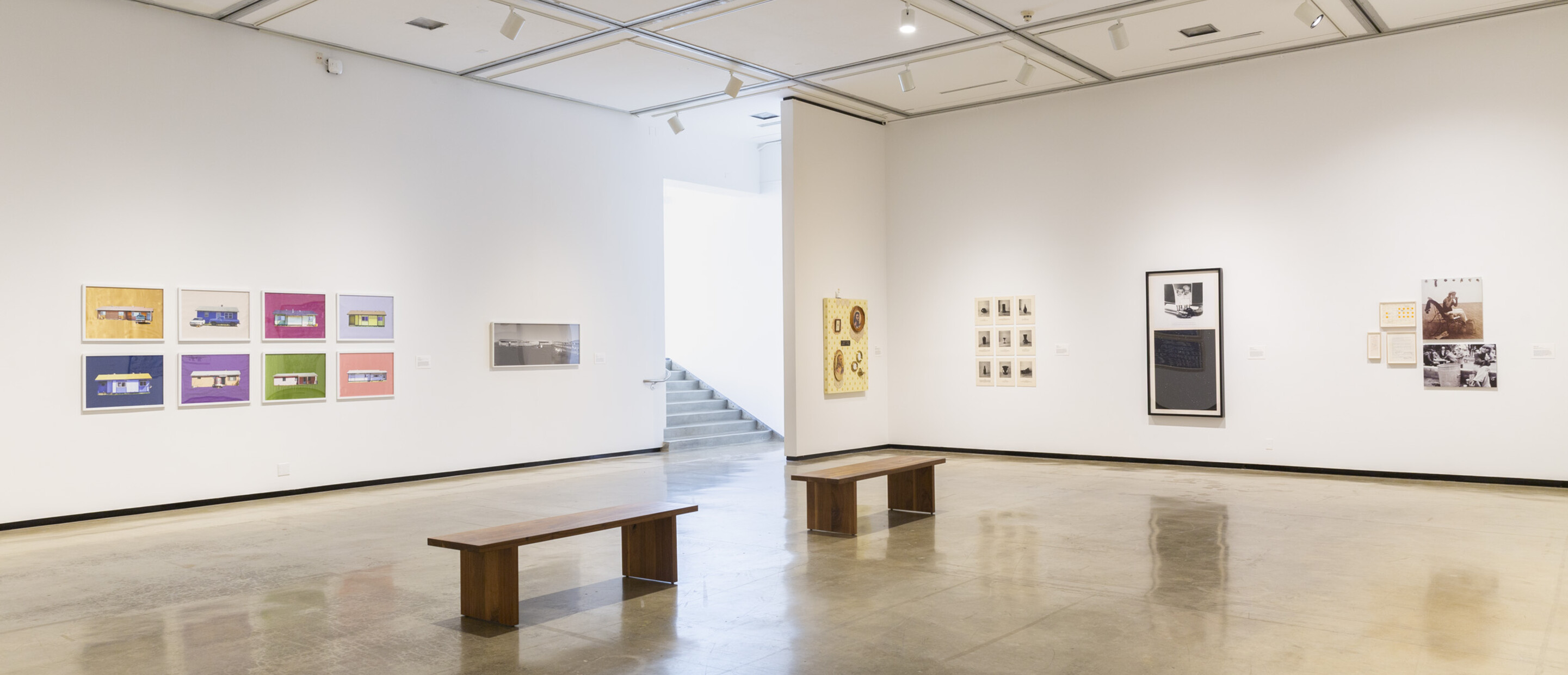 Installation view of an exhibition with artworks on the wall