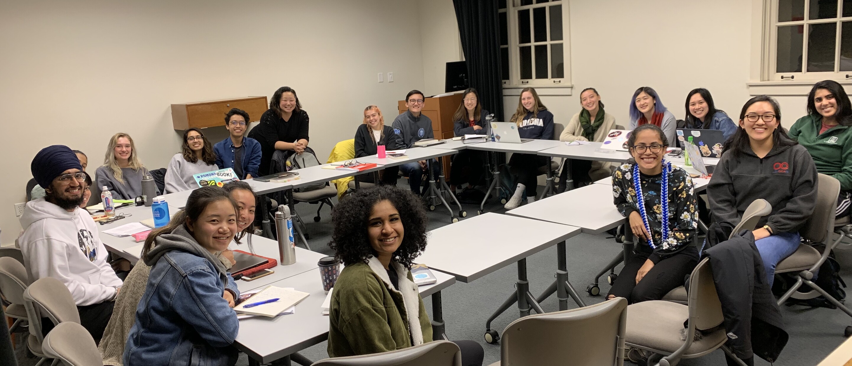 Classroom of students in a rectangular roundtable 