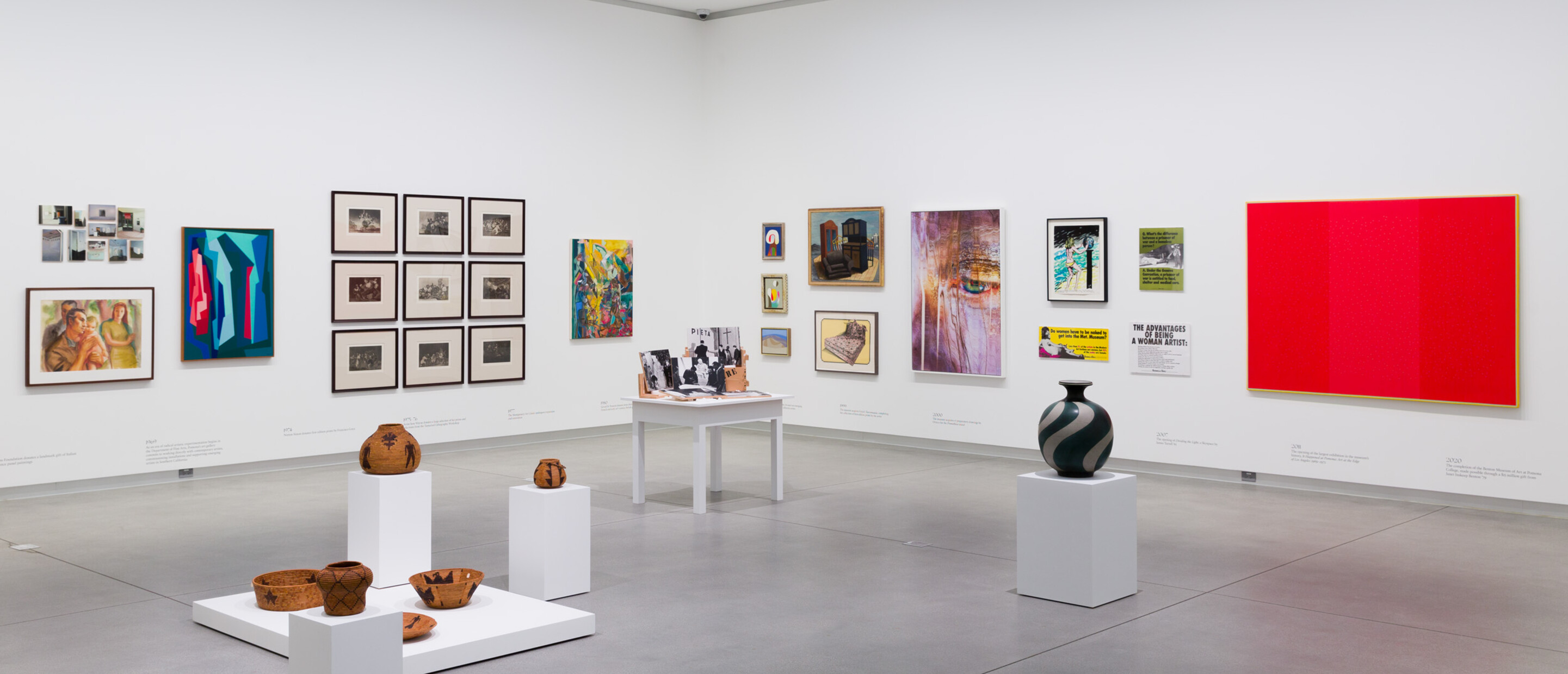 Works of art on pedestals and installed on gallery walls