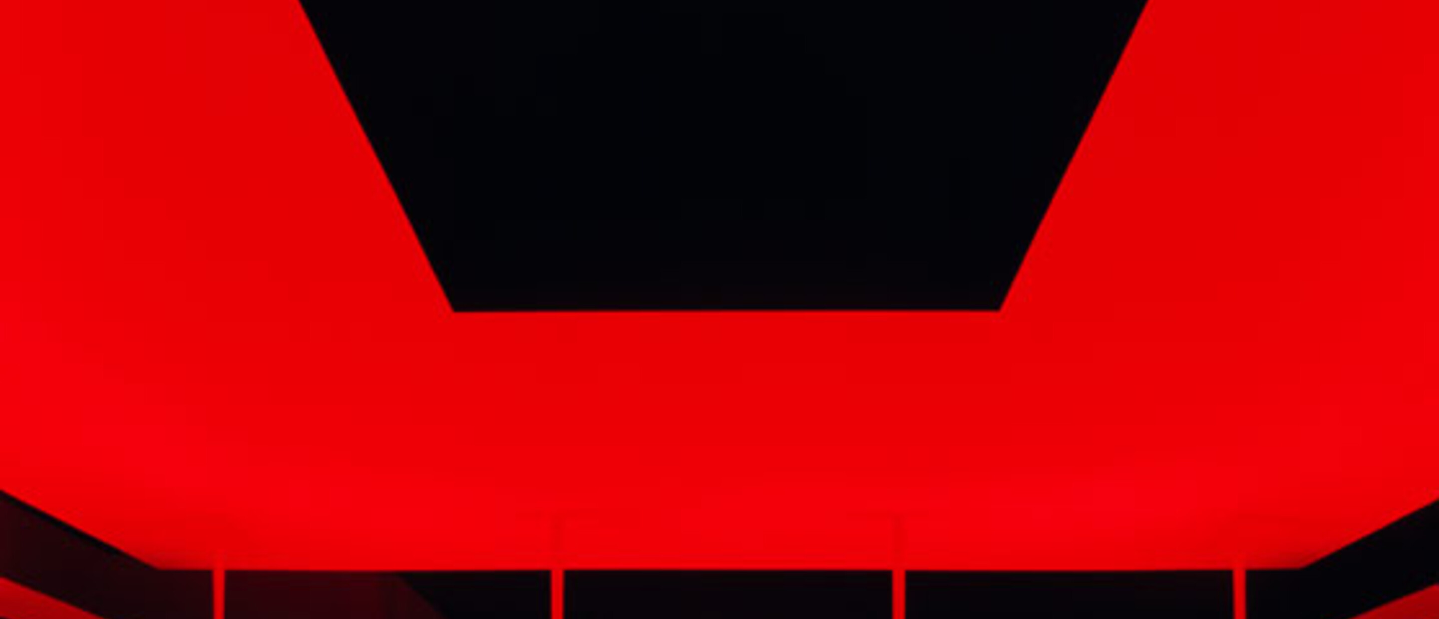 Nighttime view of the James Turrell Skyspace with red lighting