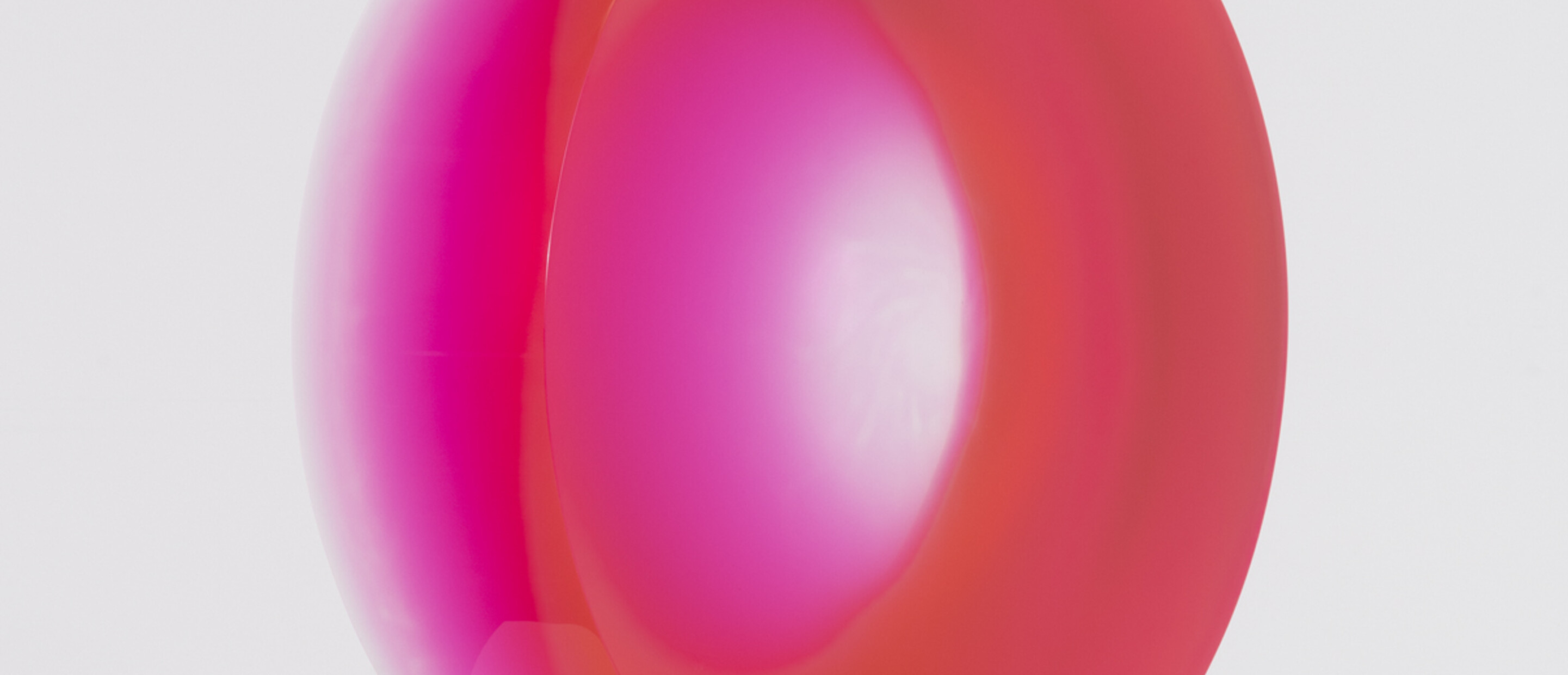 Pink disc on white pedestal