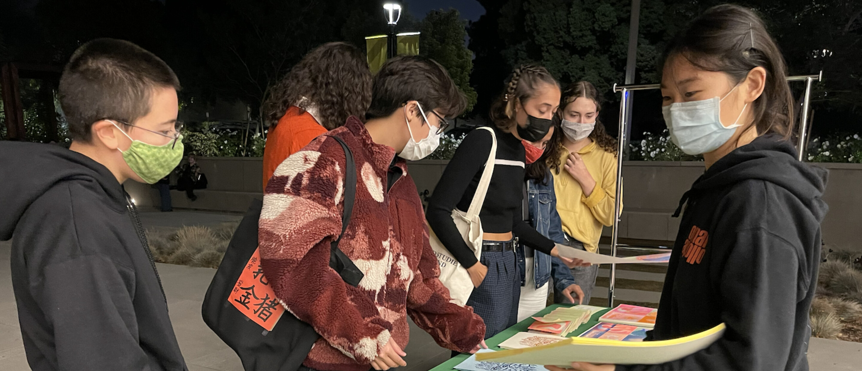 students selling art 