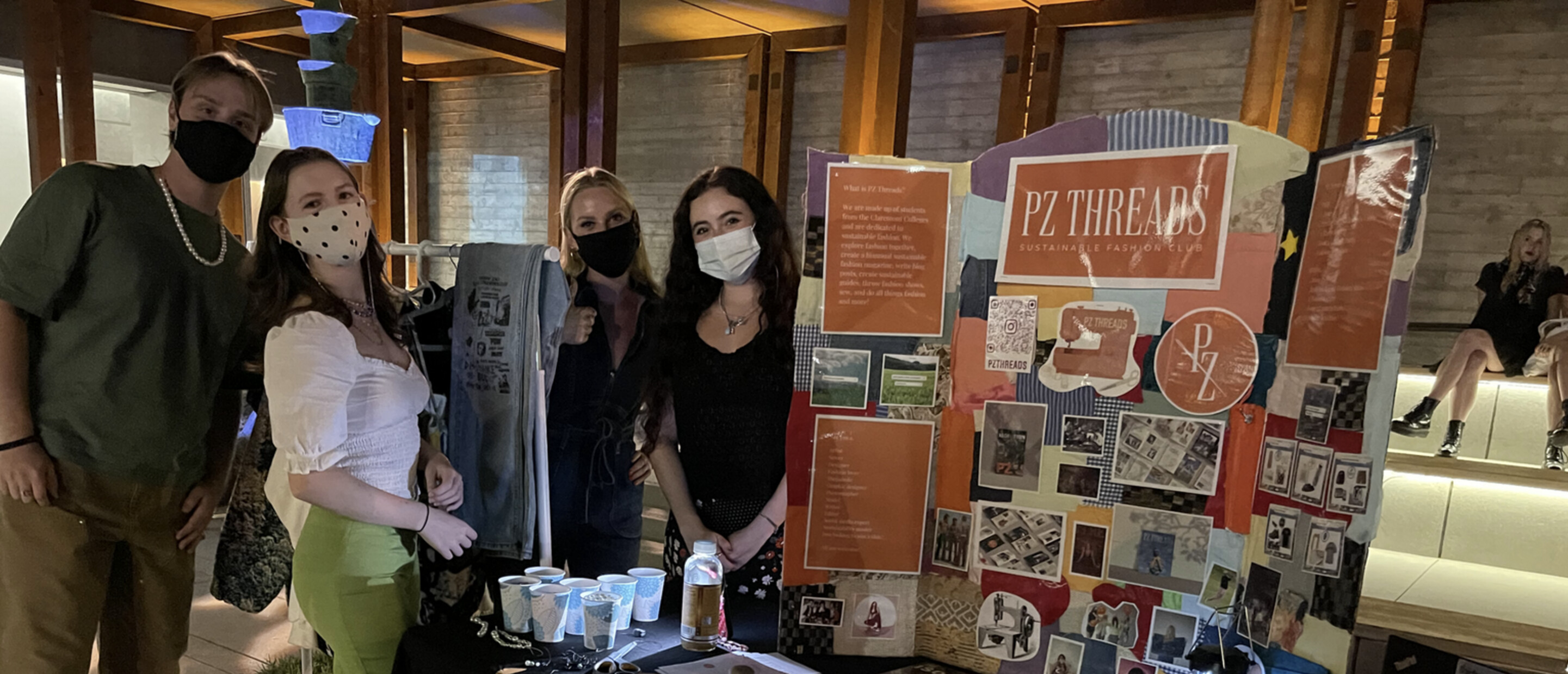 group of people next to decorated table 