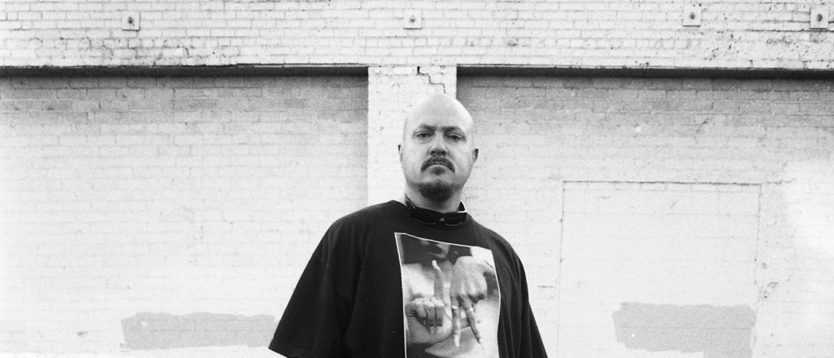 Man standing in front of car 