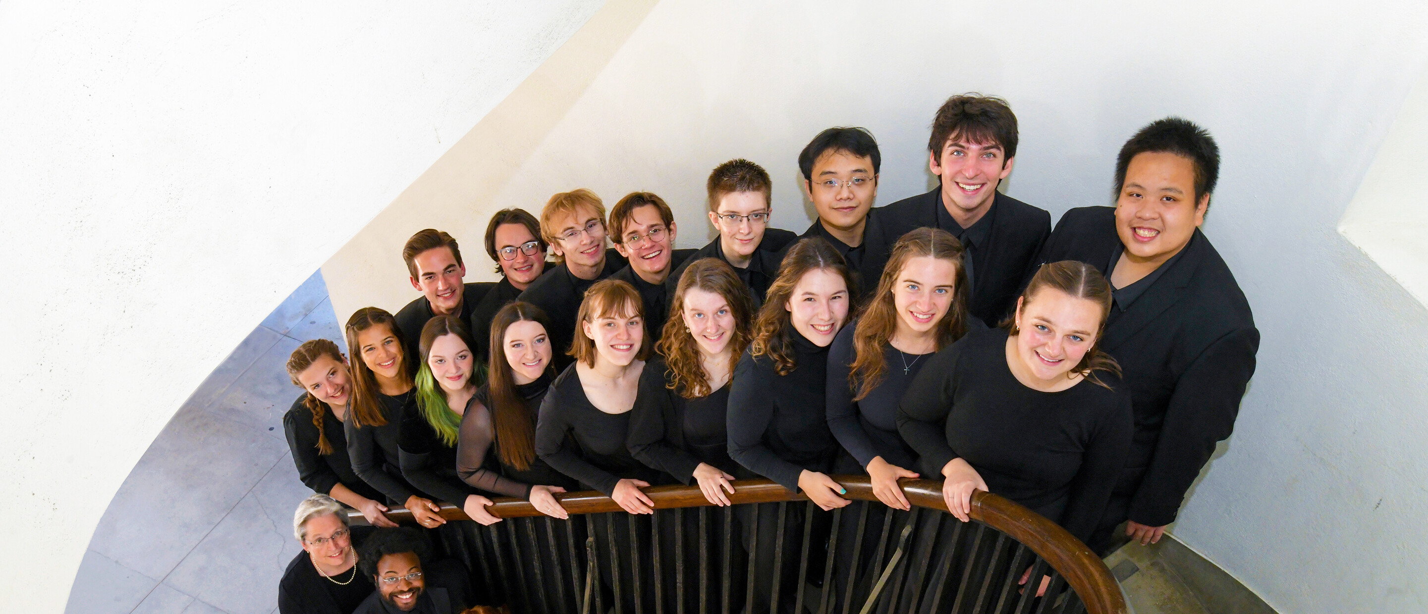 Glee club members on stairwell