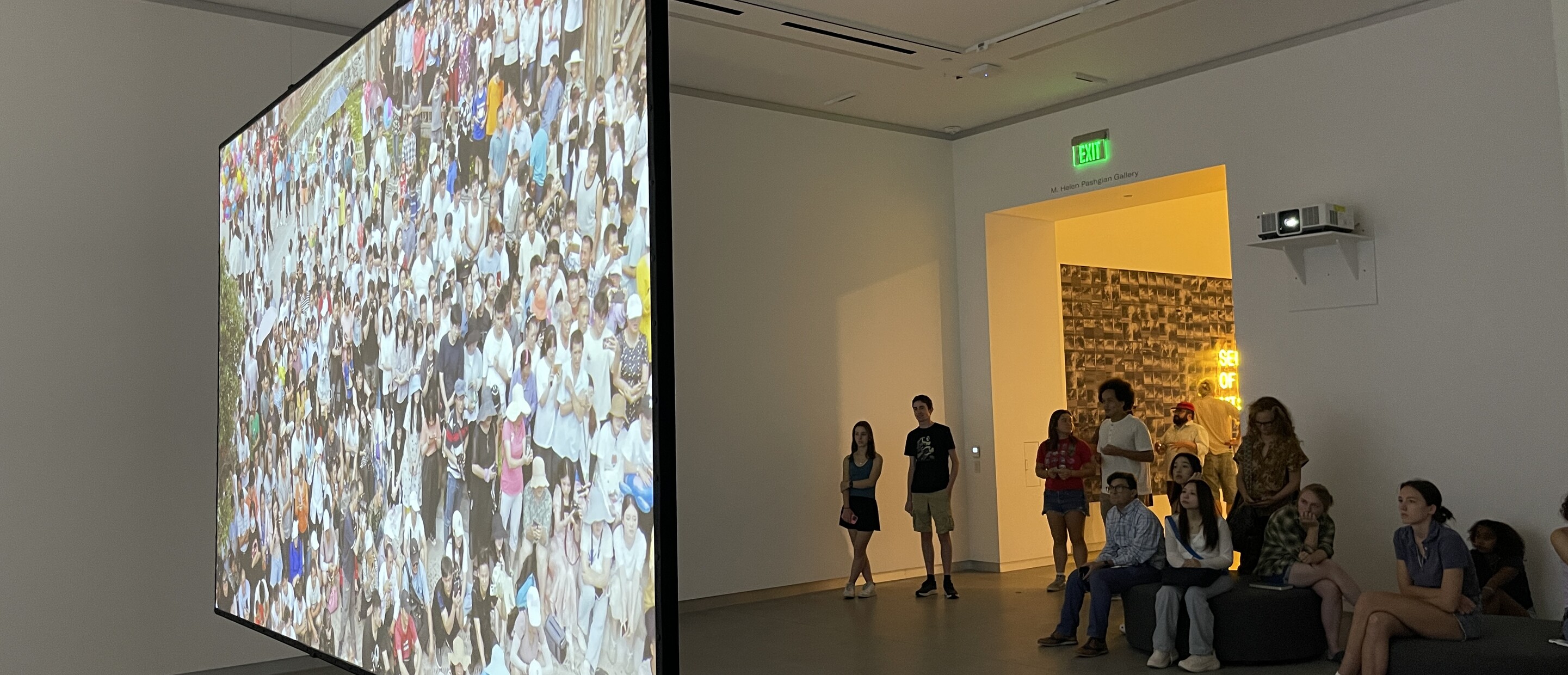 People watching art video