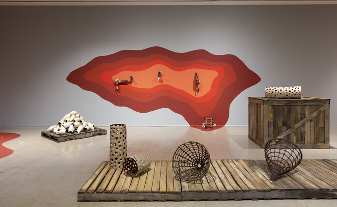 Installation view of Courtney Leonard's exhibition with sculpture and paintings