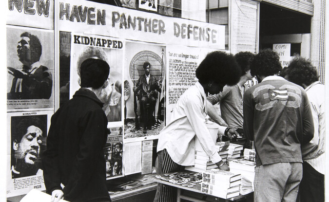 Black and white photographic image showing a info table