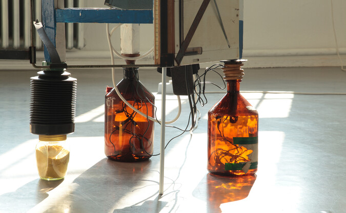 Bottles connected with lines on ground
