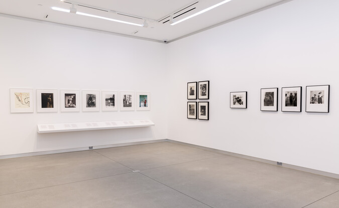 Framed works of art installed in gallery 