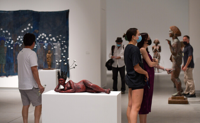 People inside a museum gallery 
