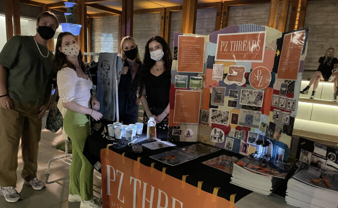 group of people next to decorated table 