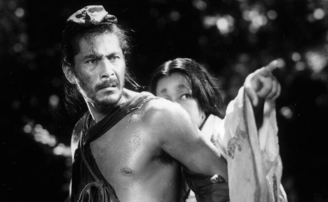 film still from Rashomon film with the thief and wife characters