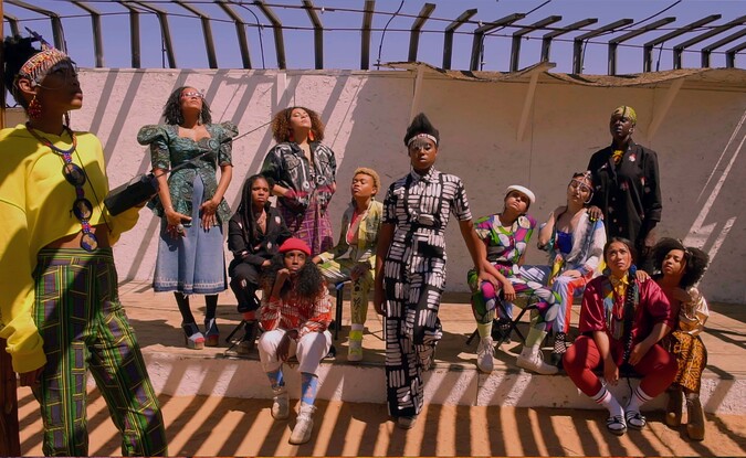 group of women wearing colorful clothing