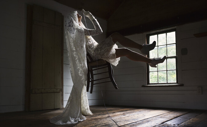 woman levitating on chair