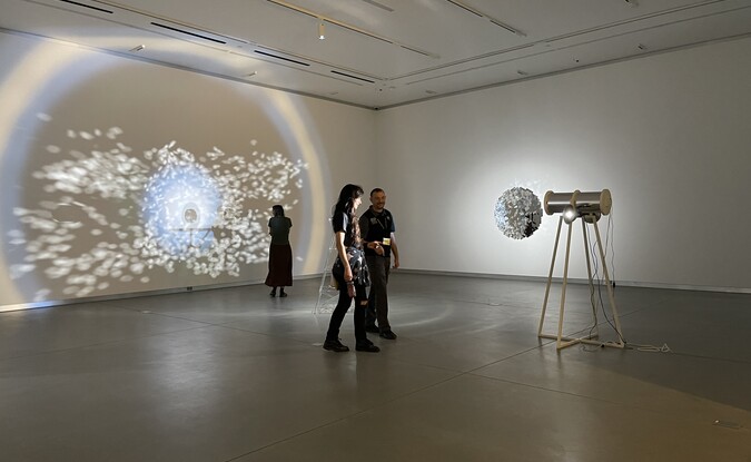 people in art gallery