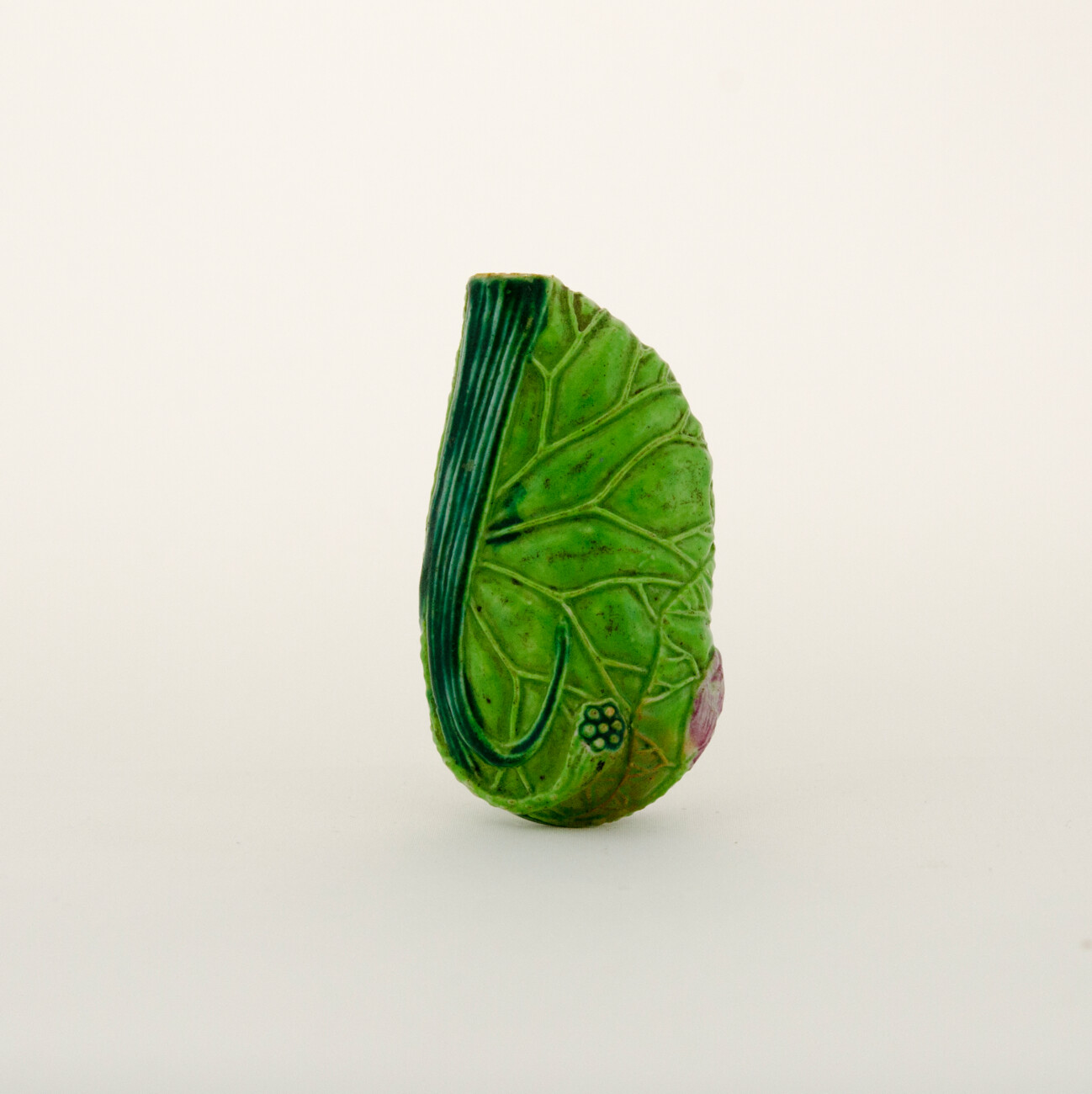 Porcelain snuff bottle green color and designed like a leaf