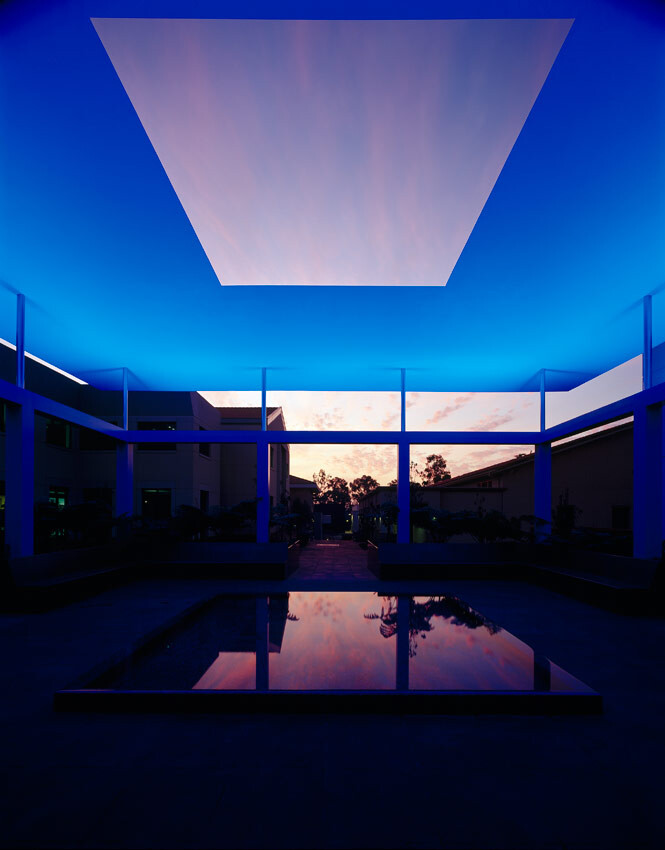 Nighttime view of the James Turrell Skyspace with blue lighting
