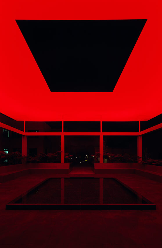 Nighttime view of the James Turrell Skyspace with red lighting