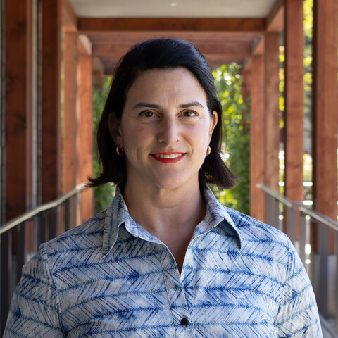 woman with blue collared top