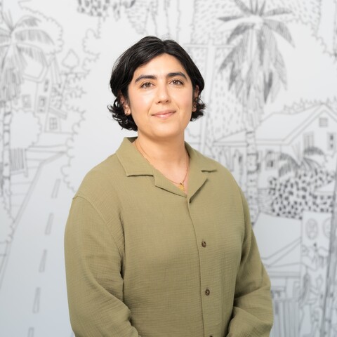 woman smiles at camera