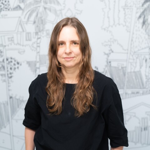 woman smiles at camera