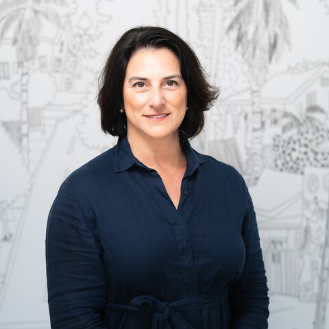 woman smiles at camera