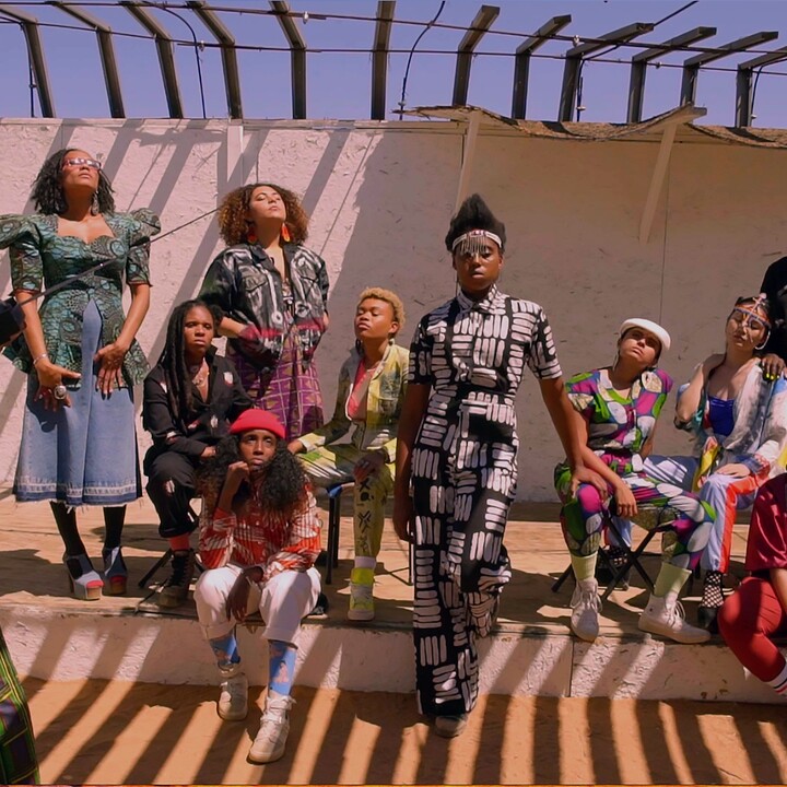group of women wearing colorful clothing