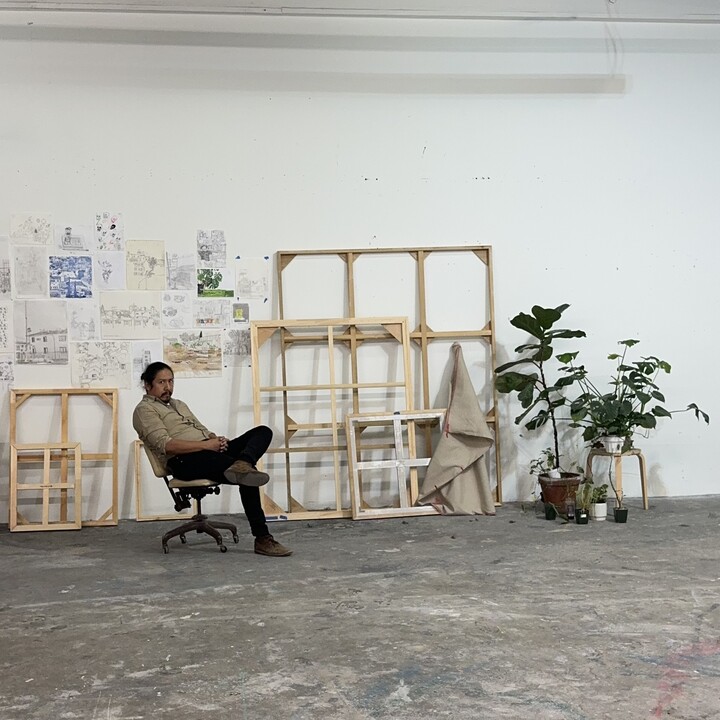 sitting person in studio