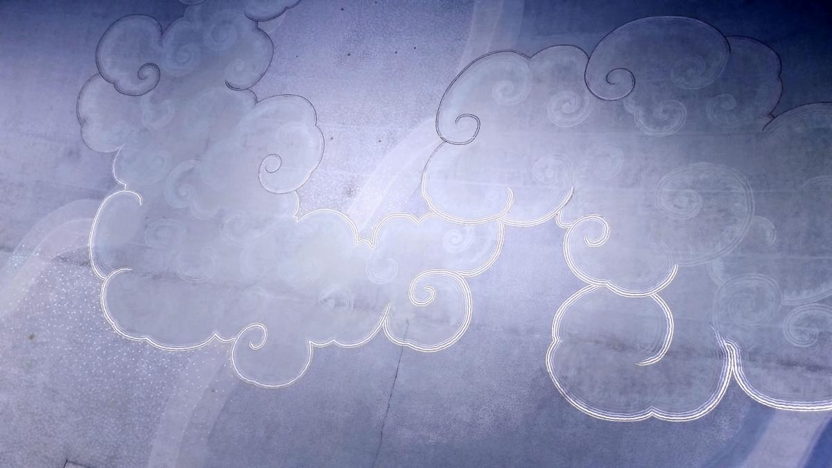 A blue and white picture of the stylized clouds from the ceiling mural of Bridges Auditorium