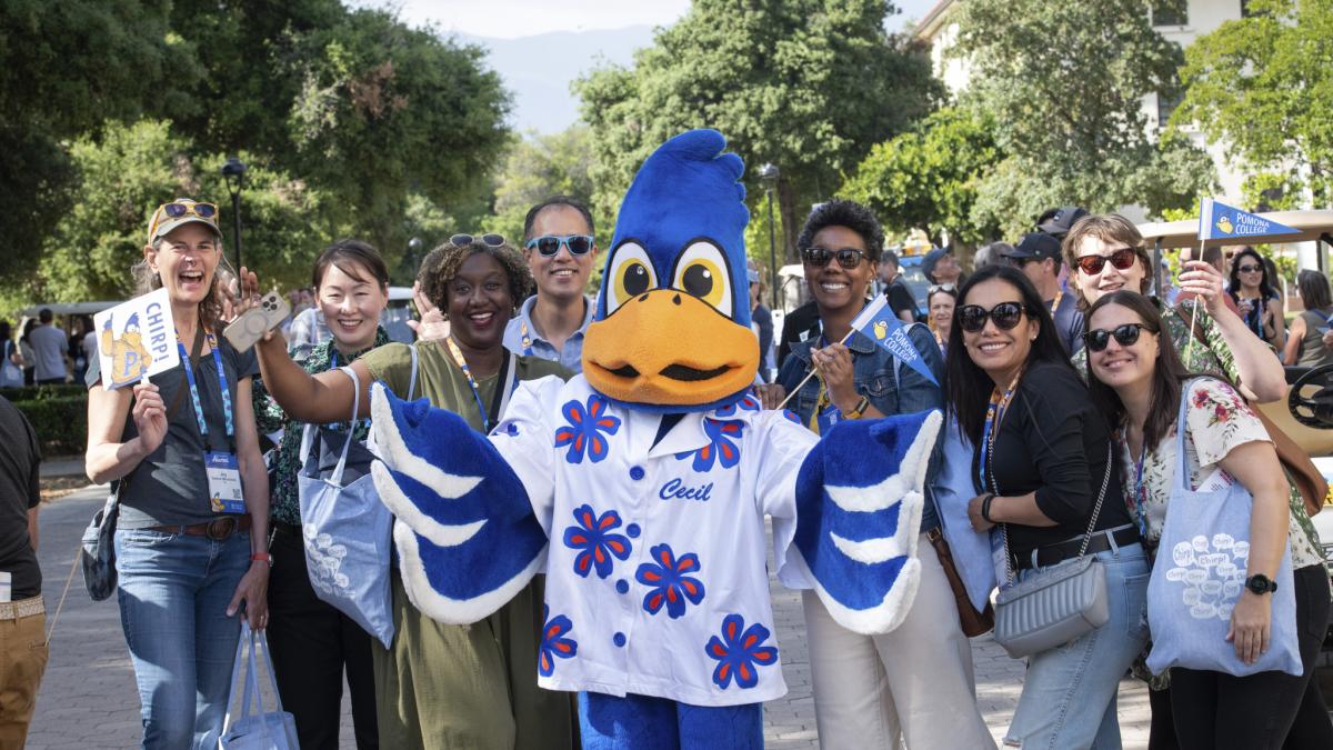 Alumni on campus with Cecil, Pomona College's mascot