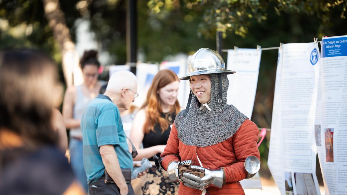 A student in medieval garb.