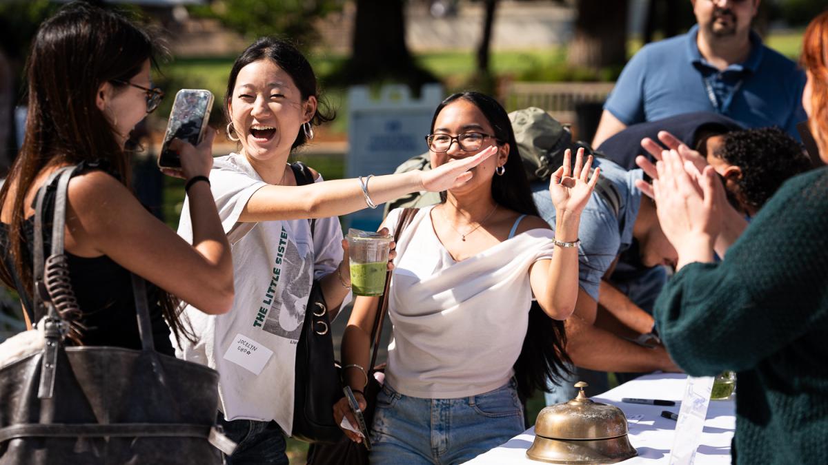 Students ring a bell