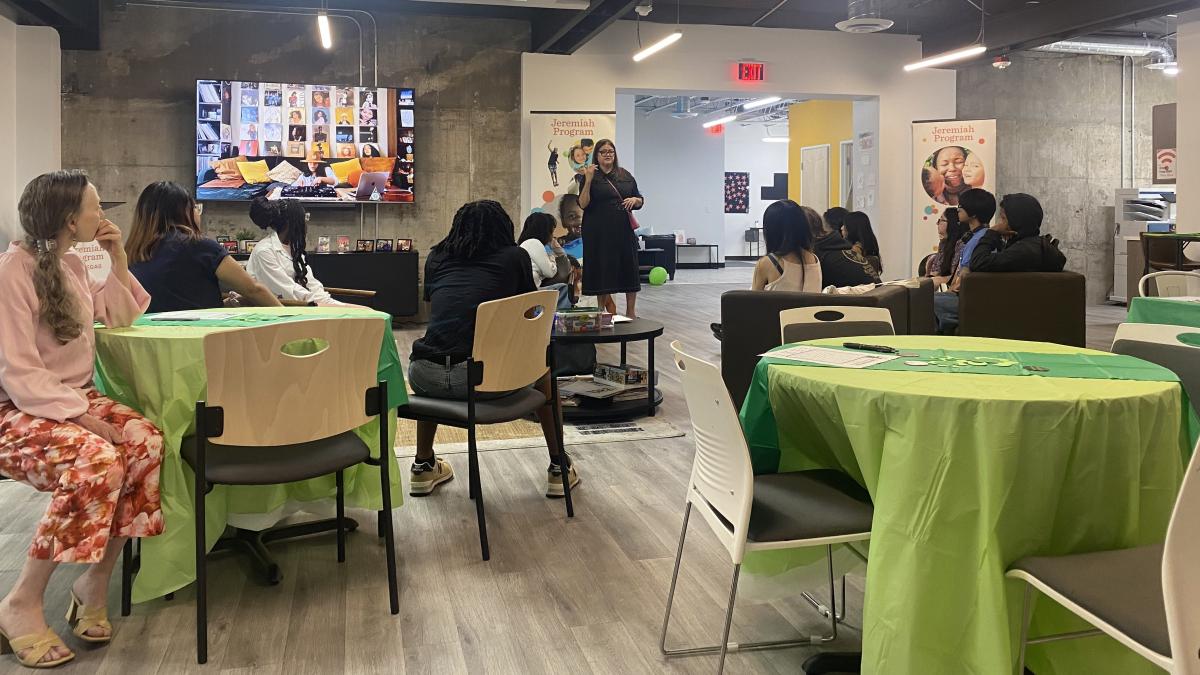 Students listen to a presentation