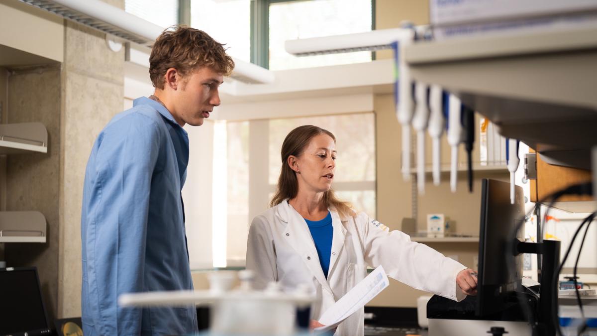 Professor Keri Wilson and student in biology lab