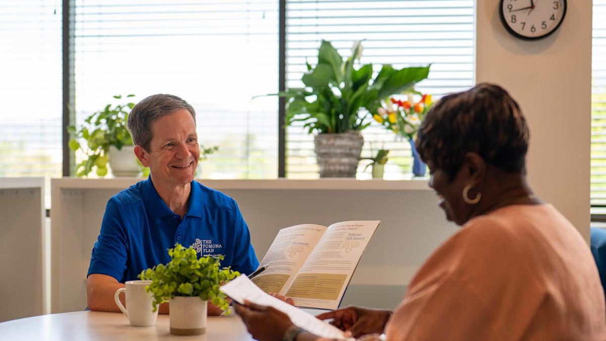 Woman talks with financial advisor