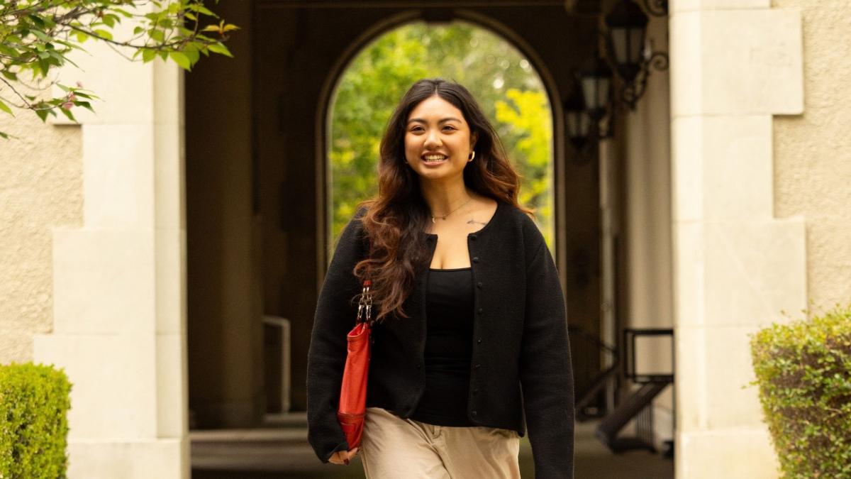 Pomona student walking through campus.