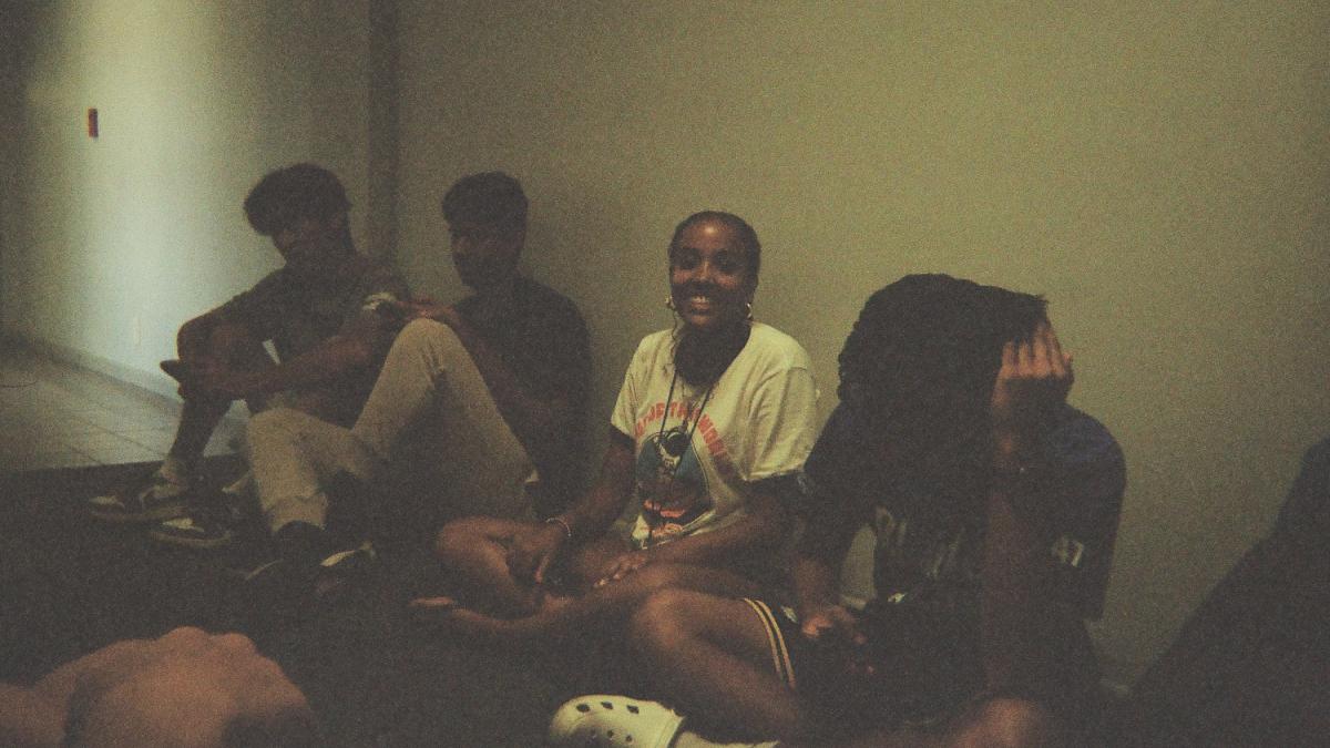 Students sit inside