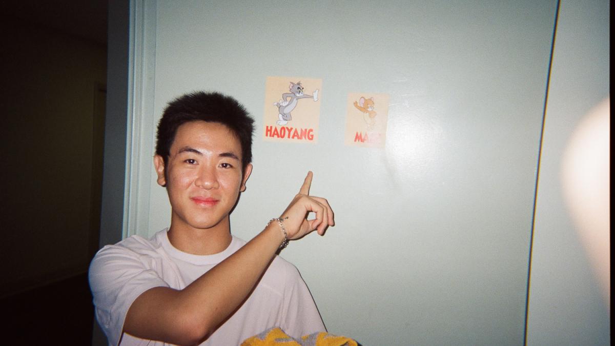 Students points at door