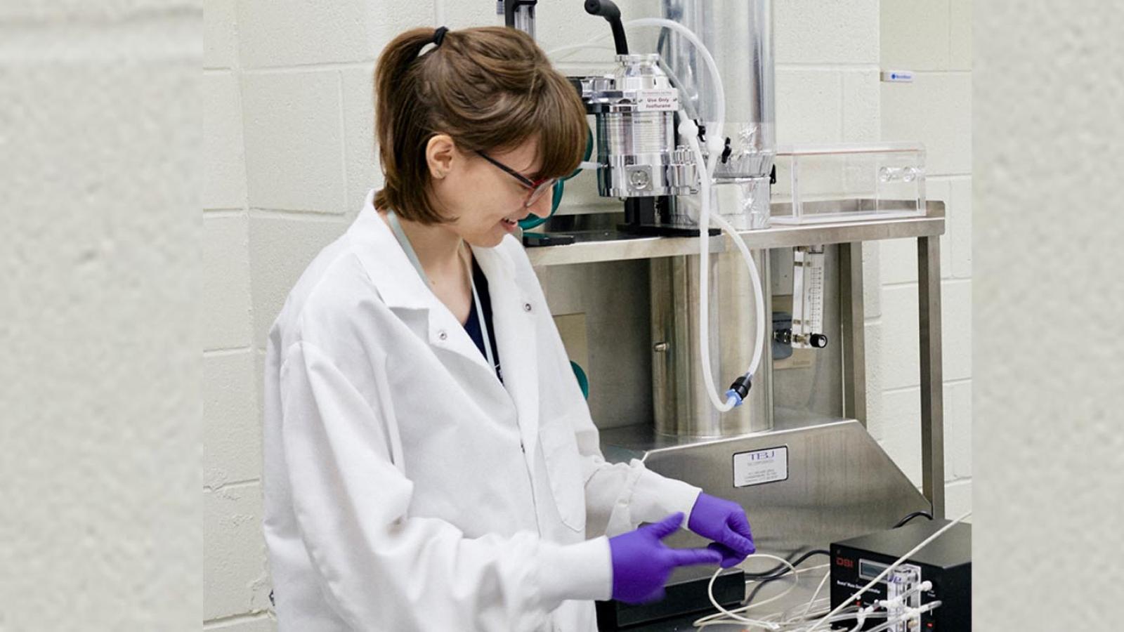 Hannah Caris in a laboratory.