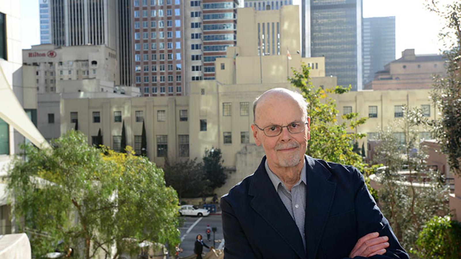 Bob Herman in front of downtown L.A.'s Central Library