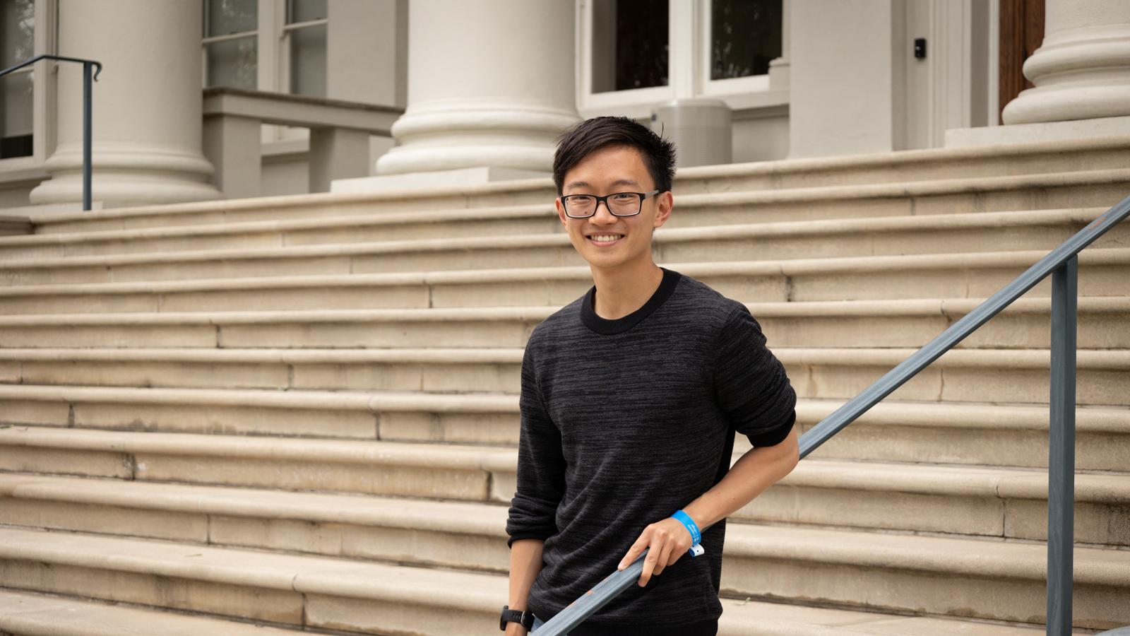 Isaac Cui class of 2020 posing in front of Carnegie Hall